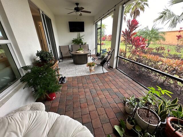 9624 SW Royal Poinciana Dr, Port Saint Lucie, FL 34987 - view of patio / terrace with ceiling fan
