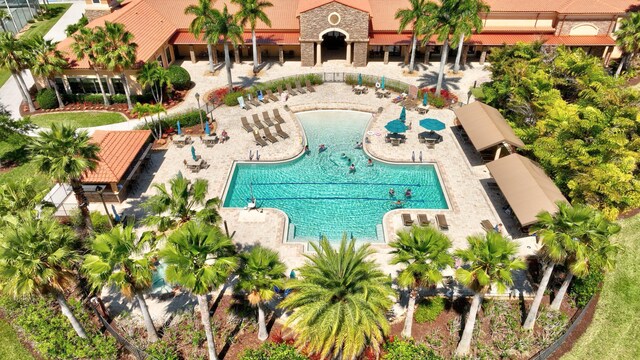 9624 SW Royal Poinciana Dr, Port Saint Lucie, FL 34987 - view of subject property with a pool