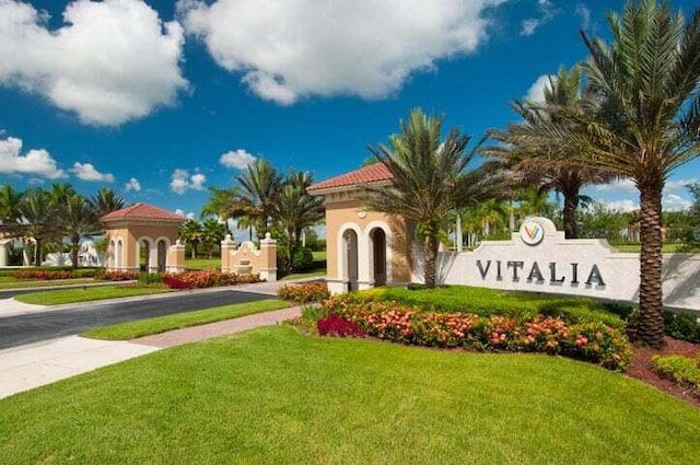 9624 SW Royal Poinciana Dr, Port Saint Lucie, FL 34987 - community / neighborhood sign with a lawn