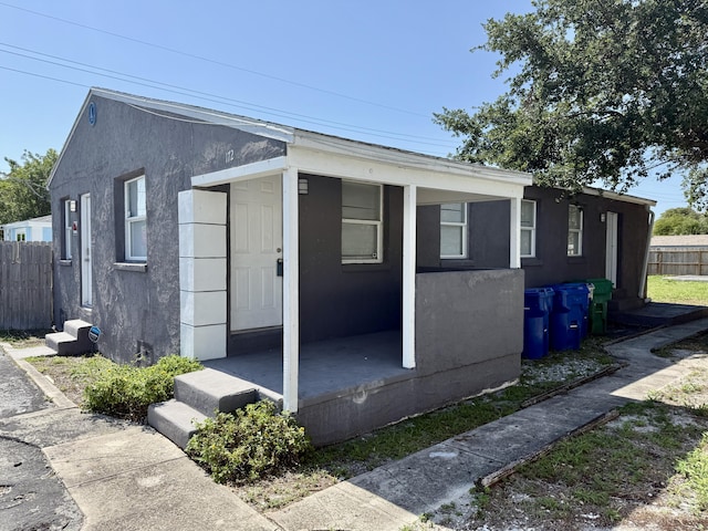 172 W 15th St, Riviera Beach, FL 33404 - view of property exterior with stucco siding