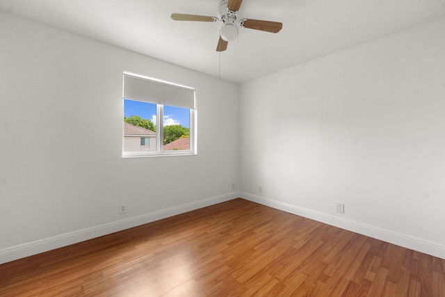 4474 Foxtail Ln, Weston, FL 33331 - spare room featuring light wood-style floors, ceiling fan, and baseboards