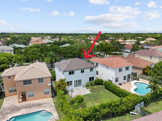 4474 Foxtail Ln, Weston, FL 33331 - aerial perspective of suburban area featuring a pool area