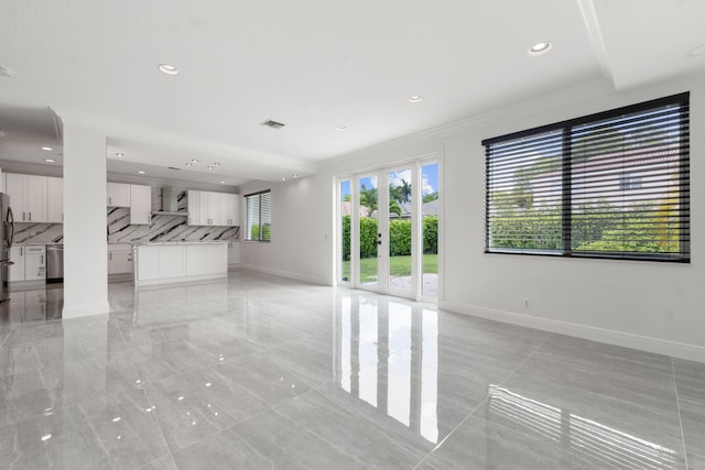 4474 Foxtail Ln, Weston, FL 33331 - unfurnished living room with ornamental molding, baseboards, and recessed lighting