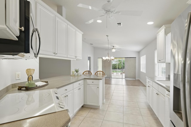 10453 SW Stratton Dr, Port Saint Lucie, FL 34987 - kitchen with stainless steel appliances, white cabinetry, a ceiling fan, and recessed lighting