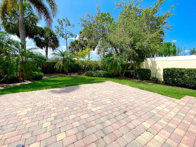 10453 SW Stratton Dr, Port Saint Lucie, FL 34987 - fenced backyard featuring a patio