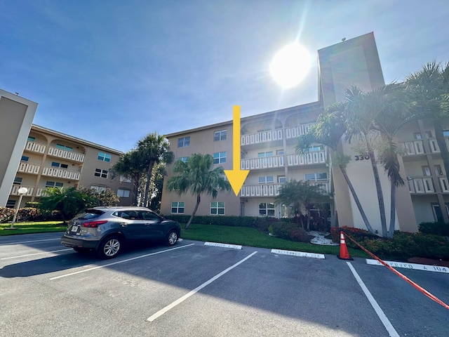 3301 Aruba Way Unit A1, Coconut Creek, FL 33066 - view of apartment building / complex with uncovered parking