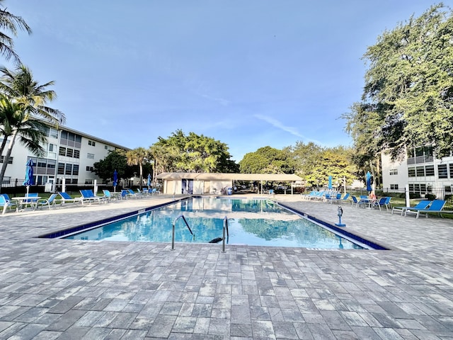 3301 Aruba Way Unit A1, Coconut Creek, FL 33066 - community pool featuring a patio area