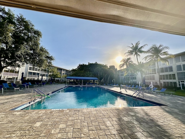 3301 Aruba Way Unit A1, Coconut Creek, FL 33066 - community pool featuring a patio