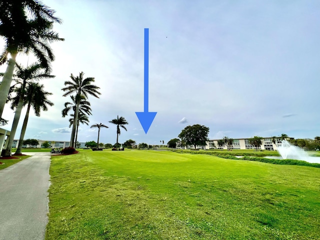 3301 Aruba Way Unit A1, Coconut Creek, FL 33066 - view of community with a lawn and golf course view