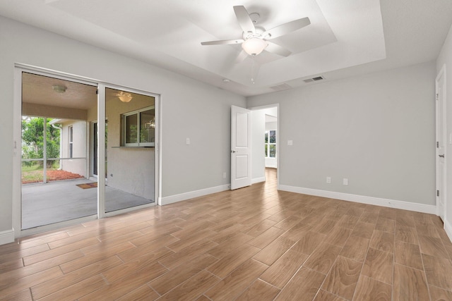 5609 Sunset Blvd, Fort Pierce, FL 34982 - unfurnished room with a ceiling fan, light wood finished floors, and baseboards