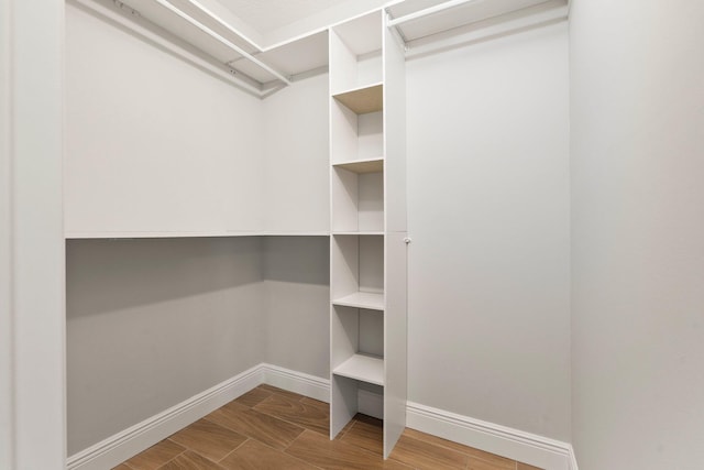 5609 Sunset Blvd, Fort Pierce, FL 34982 - walk in closet with wood finished floors