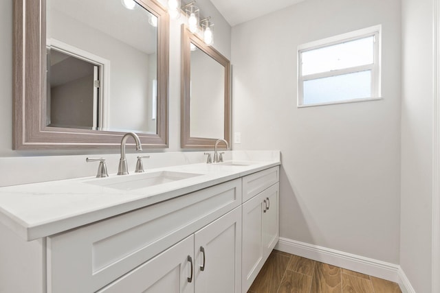 5609 Sunset Blvd, Fort Pierce, FL 34982 - bathroom with double vanity and baseboards