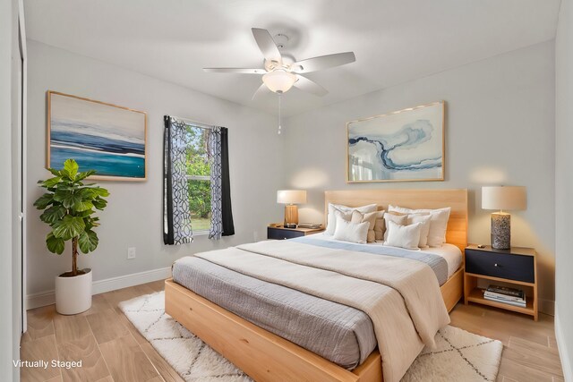 5609 Sunset Blvd, Fort Pierce, FL 34982 - bedroom featuring light wood finished floors, baseboards, and ceiling fan