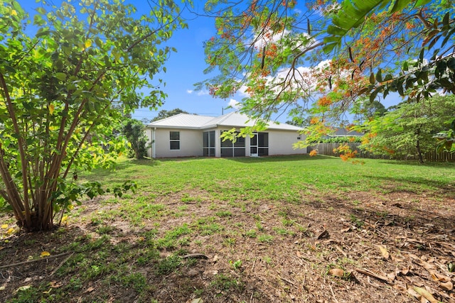 5609 Sunset Blvd, Fort Pierce, FL 34982 - view of yard with a sunroom