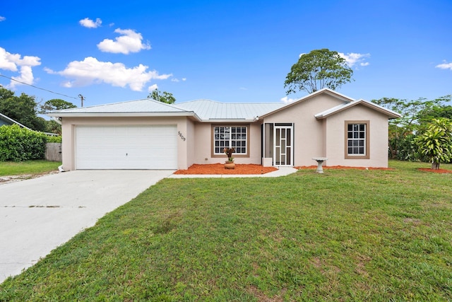 5609 Sunset Blvd, Fort Pierce, FL 34982 - single story home featuring stucco siding, an attached garage, driveway, and a front lawn