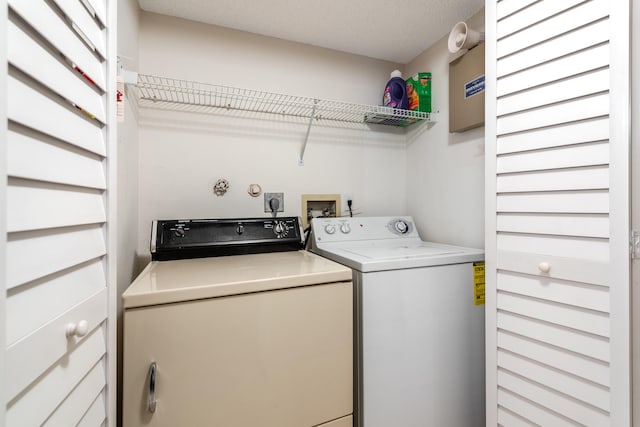 9717 Sills Dr E Unit 103, Boynton Beach, FL 33437 - laundry room featuring washing machine and dryer
