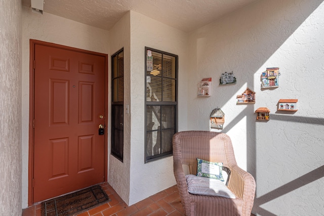 9717 Sills Dr E Unit 103, Boynton Beach, FL 33437 - doorway to property featuring stucco siding