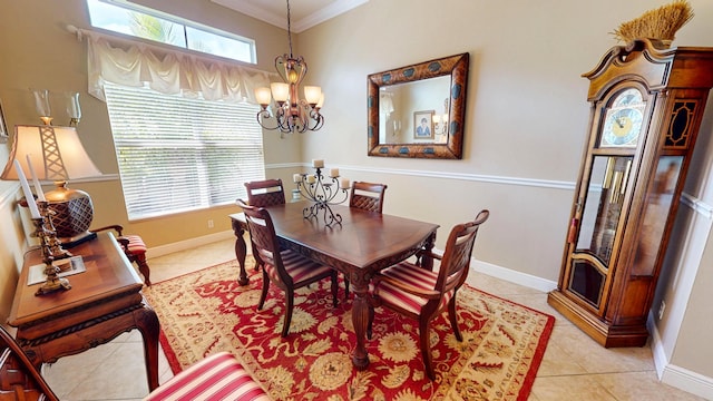 11206 SW Apple Blossom Trl, Port Saint Lucie, FL 34987 - dining area featuring a chandelier, ornamental molding, light tile patterned floors, and baseboards