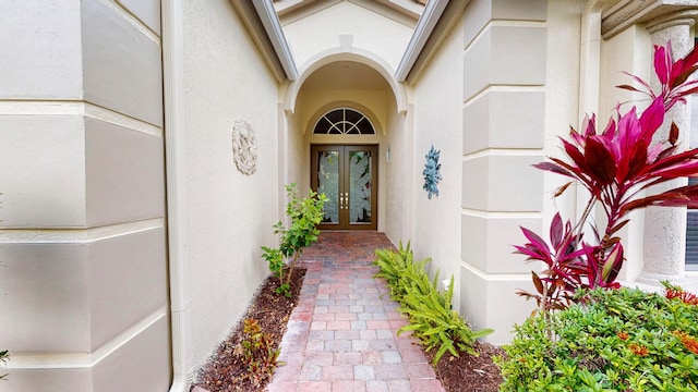 11206 SW Apple Blossom Trl, Port Saint Lucie, FL 34987 - entrance to property with french doors and stucco siding