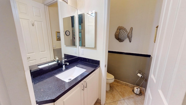 11206 SW Apple Blossom Trl, Port Saint Lucie, FL 34987 - half bath with toilet, vanity, and tile patterned floors