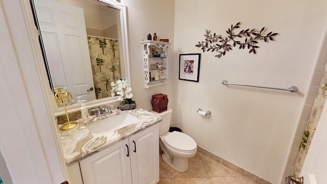 11206 SW Apple Blossom Trl, Port Saint Lucie, FL 34987 - full bath featuring toilet, vanity, and tile patterned flooring