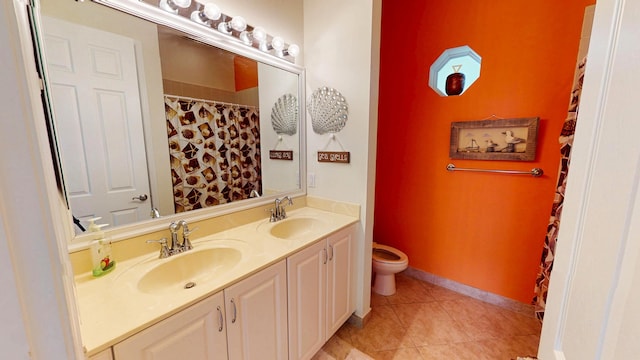 11206 SW Apple Blossom Trl, Port Saint Lucie, FL 34987 - full bath with toilet, double vanity, and tile patterned flooring