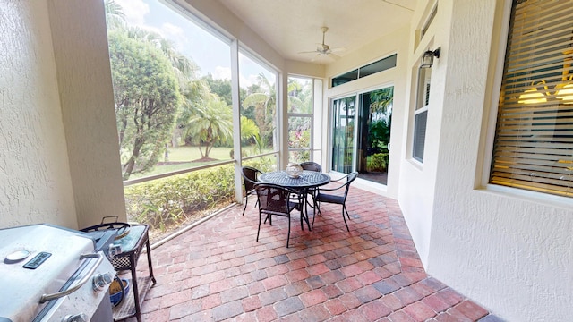 11206 SW Apple Blossom Trl, Port Saint Lucie, FL 34987 - sunroom featuring ceiling fan and outdoor dining area