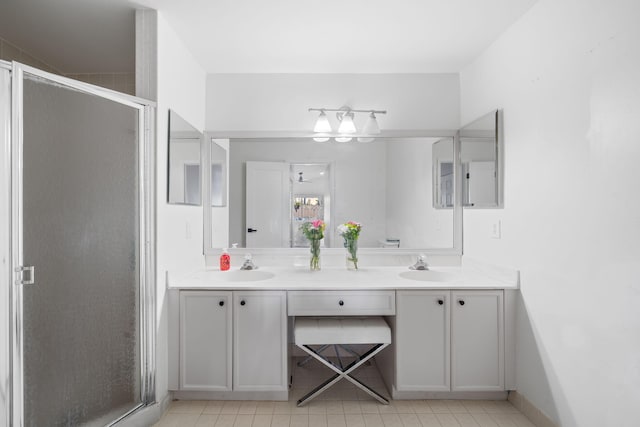 2540 NW 80th Ave, Margate, FL 33063 - bathroom featuring double vanity, a stall shower, and tile patterned flooring