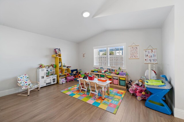 2540 NW 80th Ave, Margate, FL 33063 - rec room featuring wood finished floors, vaulted ceiling, and baseboards