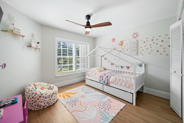 2540 NW 80th Ave, Margate, FL 33063 - bedroom with baseboards, wood finished floors, and ceiling fan