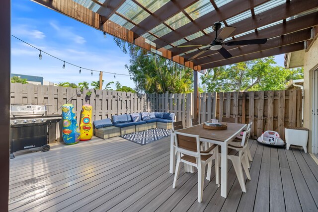 2540 NW 80th Ave, Margate, FL 33063 - wooden deck featuring a pergola, ceiling fan, grilling area, outdoor dining area, and outdoor lounge area