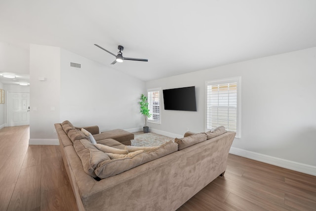 2540 NW 80th Ave, Margate, FL 33063 - living room featuring wood finished floors, baseboards, lofted ceiling, and ceiling fan