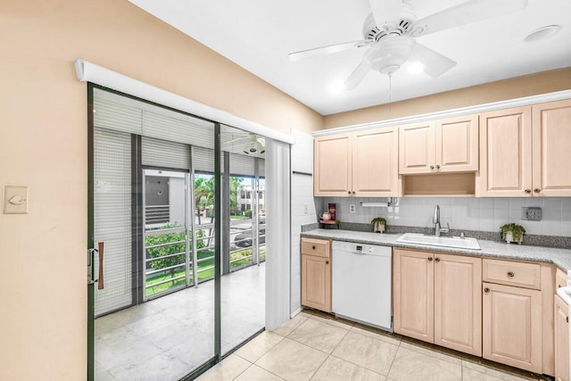 35 Capri A Unit A, Delray Beach, FL 33484 - kitchen with dishwasher, a sink, light brown cabinets, tasteful backsplash, and a ceiling fan