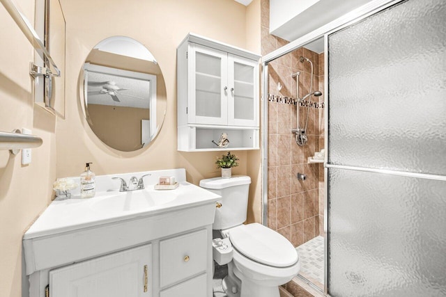 35 Capri A Unit A, Delray Beach, FL 33484 - full bathroom with a ceiling fan, toilet, a stall shower, and vanity