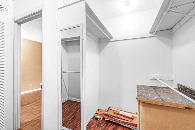 35 Capri A Unit A, Delray Beach, FL 33484 - walk in closet with wood finished floors