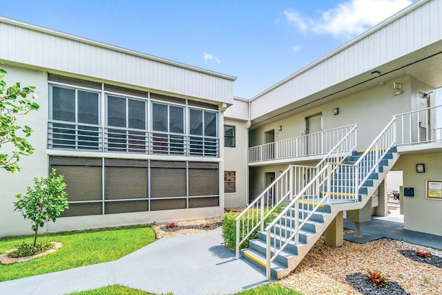 35 Capri A Unit A, Delray Beach, FL 33484 - view of building exterior featuring stairway