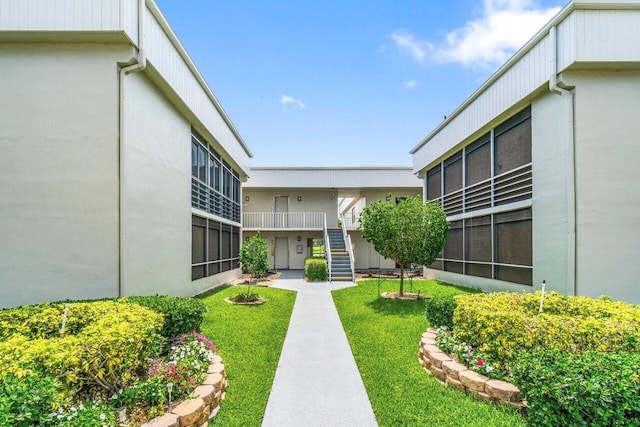 35 Capri A Unit A, Delray Beach, FL 33484 - view of community with stairs and a yard