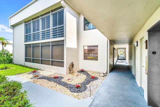 35 Capri A Unit A, Delray Beach, FL 33484 - view of exterior entry with stucco siding