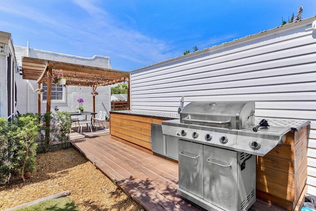 722 Valley Forge Rd, West Palm Beach, FL 33405 - wooden terrace featuring a pergola, grilling area, and outdoor dining area