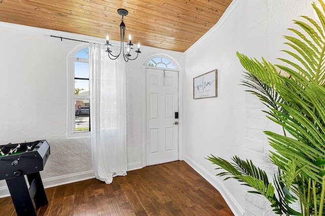722 Valley Forge Rd, West Palm Beach, FL 33405 - entryway featuring baseboards, a chandelier, plenty of natural light, crown molding, and wooden ceiling