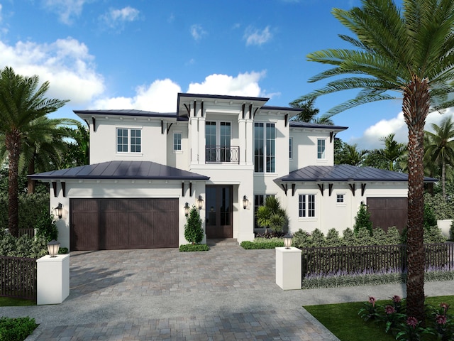 201 NE 4th Ave, Boca Raton, FL 33432 - view of front of house with a standing seam roof, stucco siding, a garage, driveway, and french doors