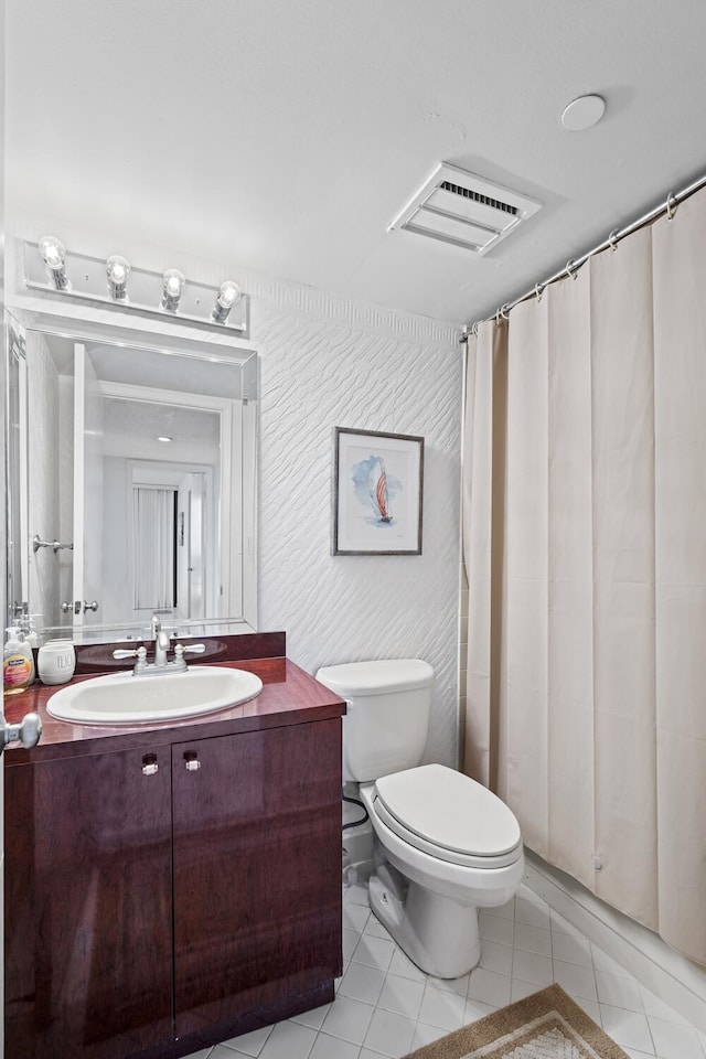 3400 S Ocean Blvd Unit 4H, Highland Beach, FL 33487 - bathroom featuring toilet, tile patterned flooring, vanity, and a shower with curtain