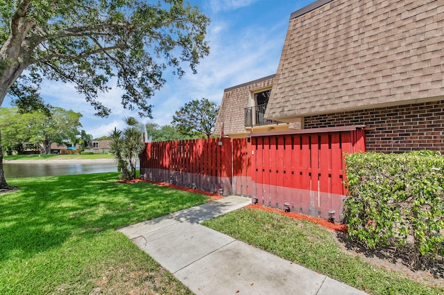 2883 SW 22nd Cir E Unit 51A, Delray Beach, FL 33445 - view of yard featuring a water view