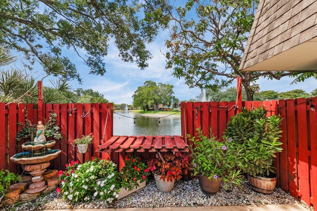 2883 SW 22nd Cir E Unit 51A, Delray Beach, FL 33445 - view of yard with a water view