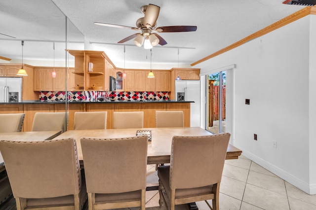 2883 SW 22nd Cir E Unit 51A, Delray Beach, FL 33445 - dining room with a ceiling fan, light tile patterned floors, baseboards, and ornamental molding