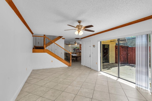 2883 SW 22nd Cir E Unit 51A, Delray Beach, FL 33445 - unfurnished living room featuring ornamental molding, a ceiling fan, stairway, baseboards, and a textured ceiling