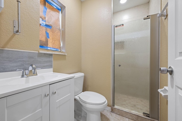 1332 SW G, Belle Glade, FL 33430 - full bath with toilet, a stall shower, vanity, and a textured wall