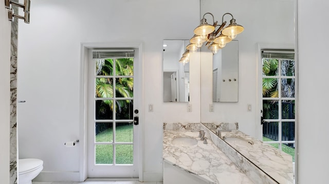 7245 Montrico Dr, Boca Raton, FL 33433 - bathroom with vanity, a chandelier, toilet, and baseboards