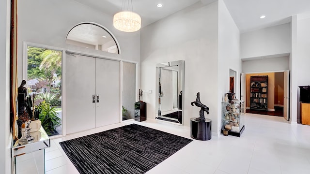 7245 Montrico Dr, Boca Raton, FL 33433 - foyer entrance featuring a high ceiling, a chandelier, and recessed lighting