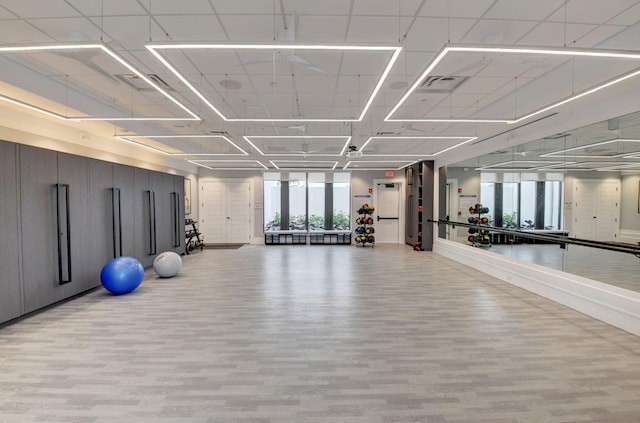 17112 Aquavera Way, Boca Raton, FL 33496 - workout area with light wood finished floors and baseboards
